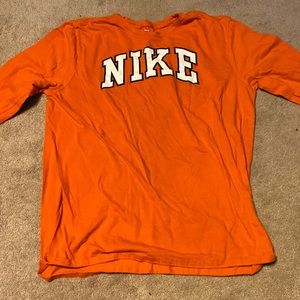 Orange Nike shirt